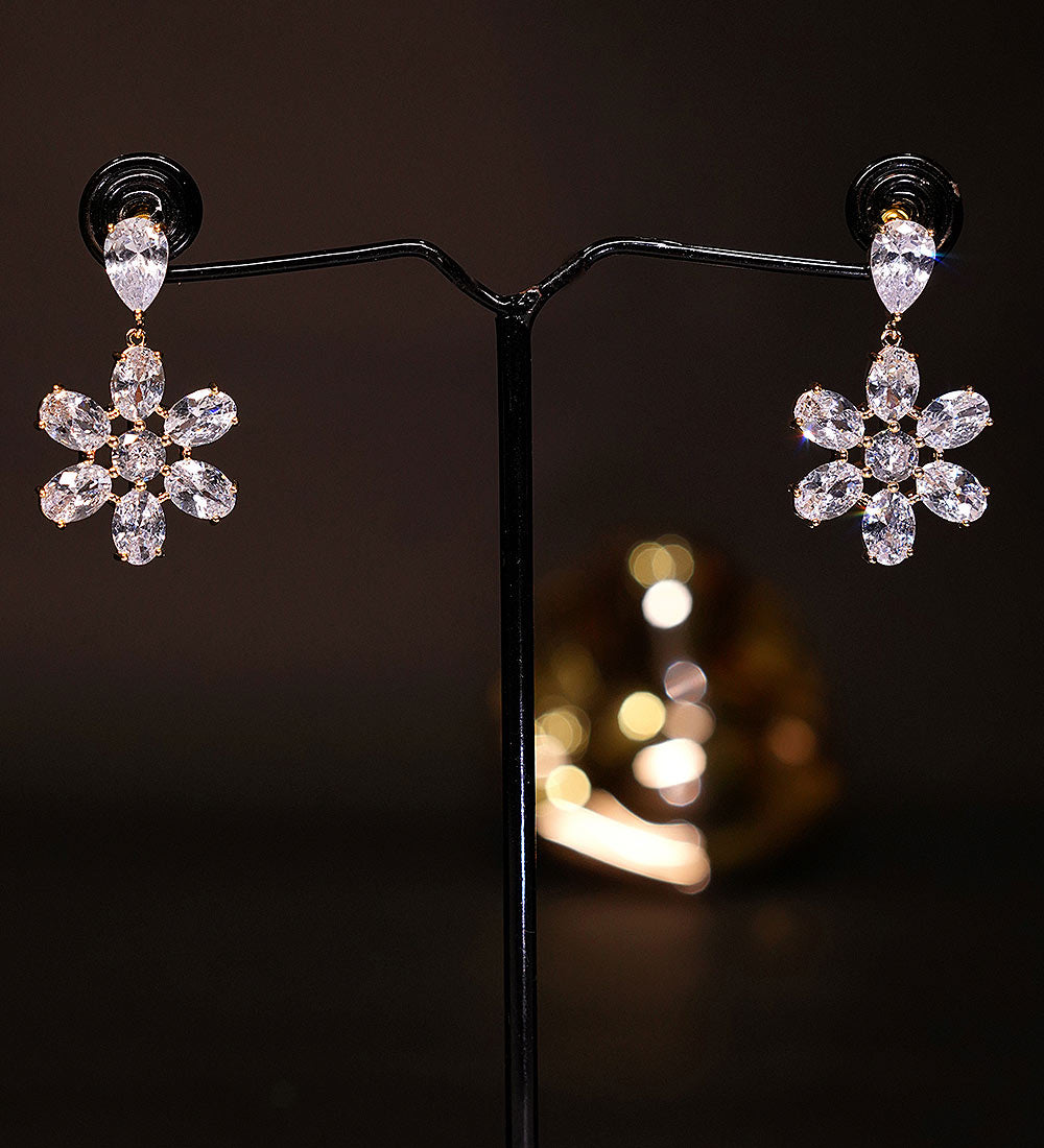 Floral-shaped dangle earrings with teardrop