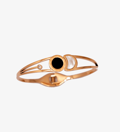 Elegant Rose Gold Bangle Bracelet with Black and White Accents